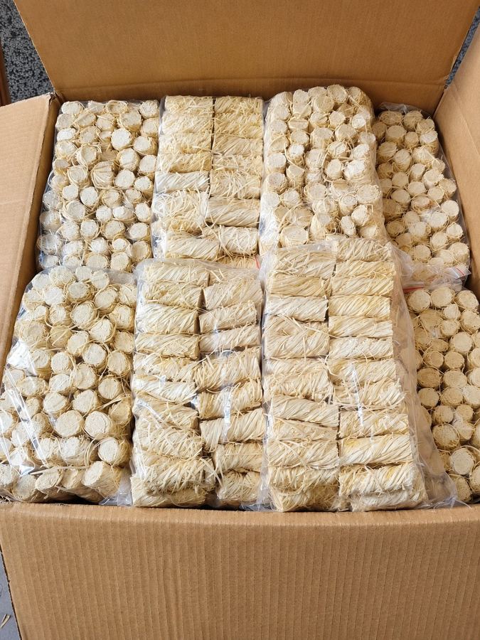 Carton of bagged firelighters